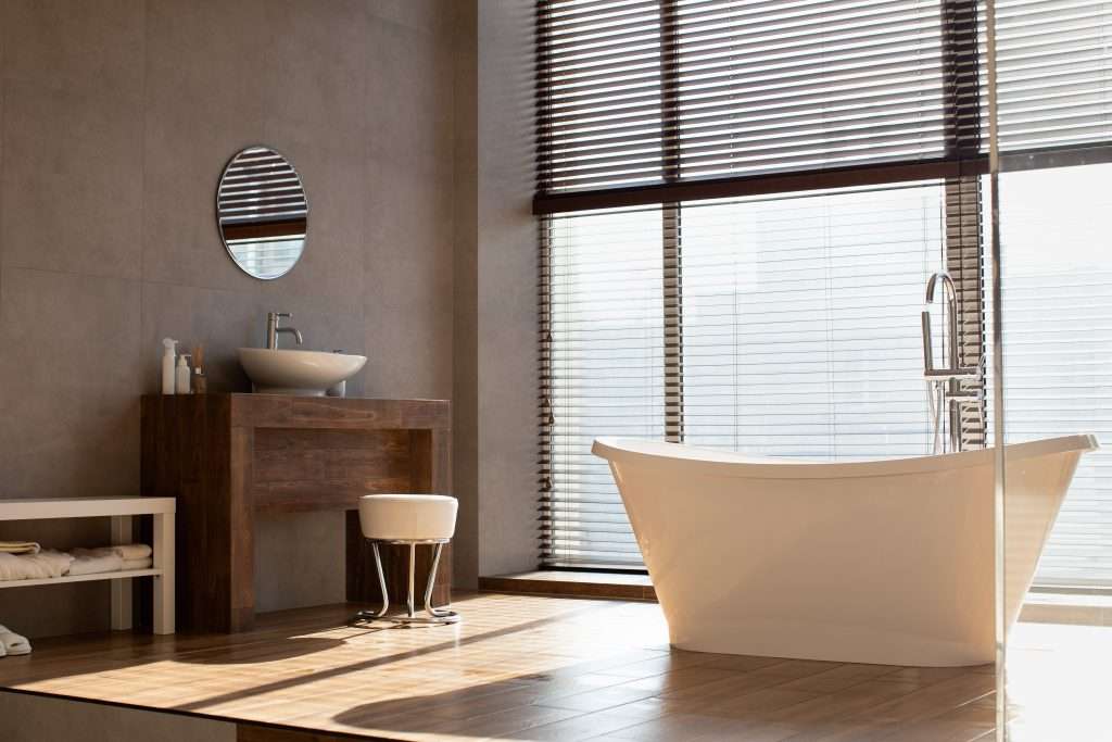 Modern bathroom with panoramic window in luxury apartment Gallery - 5